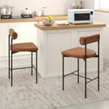 Upholstered Bar Stools Set of 2 Counter Height in brown color beside kitchen island with microwave and countertop.