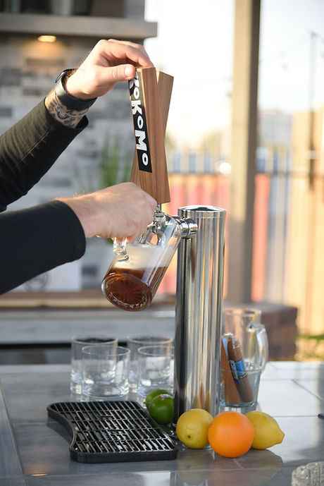 KoKoMo Bermuda Kitchen BBQ Island with Built-In TV, Fire Pit & Bar for Ultimate Outdoor Entertaining