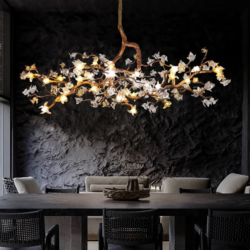 Charming Vintage Copper Flower Chandelier hanging in a stylish dining room with dark walls and modern decor.