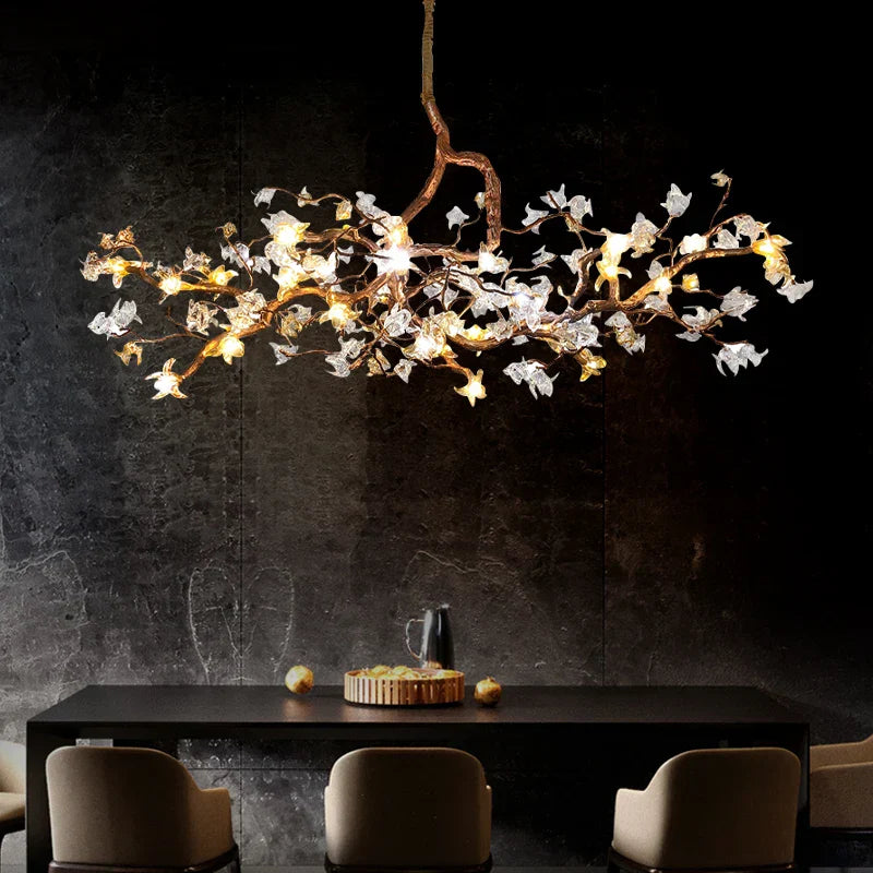 Charming Vintage Copper Flower Chandelier hanging over a dining table, featuring a unique tree branch design and LED lights.