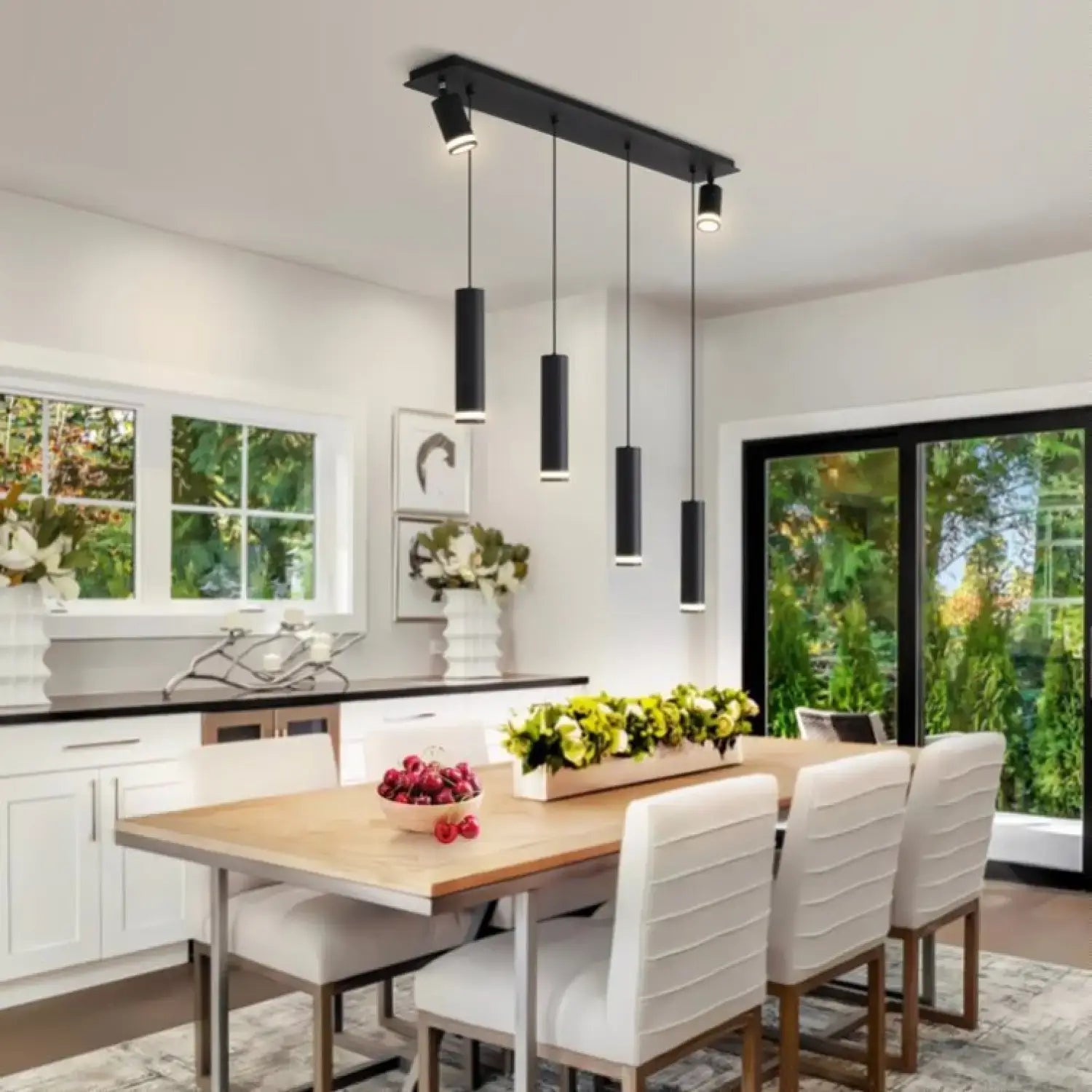 Hanging Light for Modern Kitchen Island with adjustable aluminum spotlights illuminating a dining table.