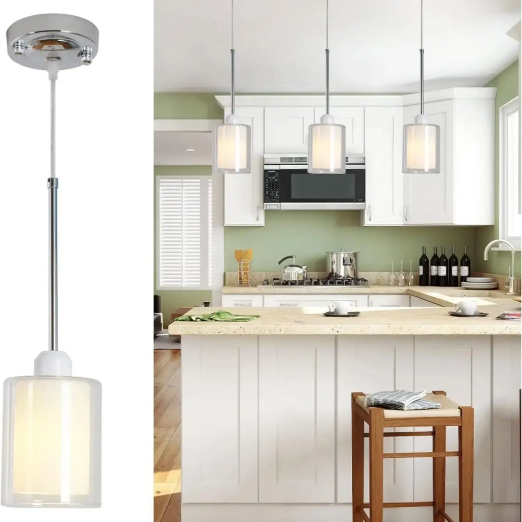Modern Glass Pendant Light with Chrome Nickel Finish for Kitchen Island illuminating a stylish kitchen island.